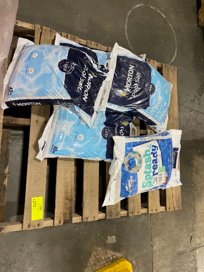 Assorted banners and 5x40lbs bags of pool salt, lot of 2