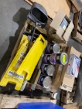 Assorted wet floor signs, paper dispenser, paint and acrylic scoops