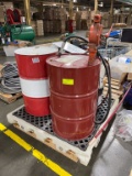 Exxon Mobil 2 gear oil retention drums with 4 oil buckets