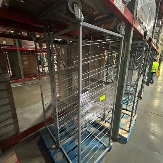 Slanted metal shelf on casters