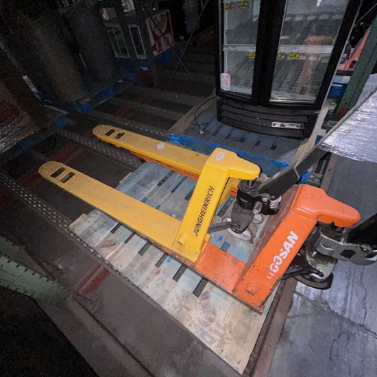 Lot of 2 pallet jacks - Junhheinrich 5500lb capacity & Doosan 5500lb capacity