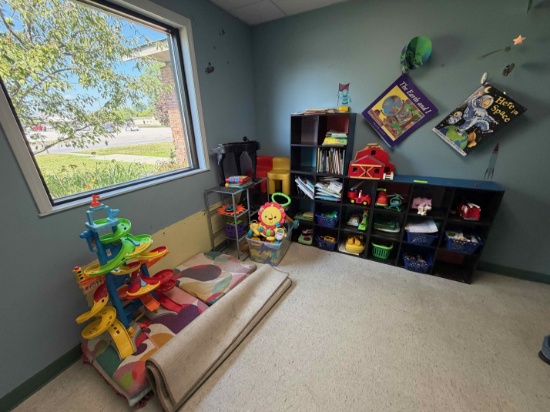 Lot of wooden shelves, metal shelf, toys & books, floor cushions & rug