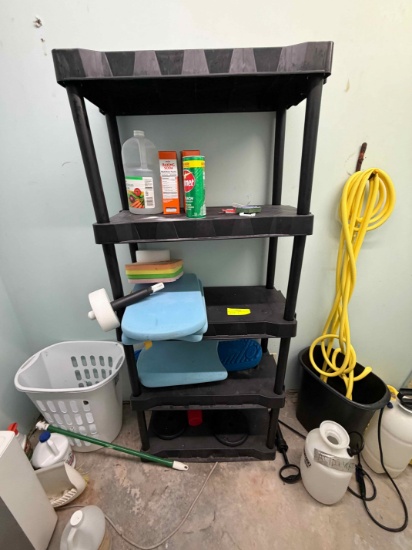 Lot of 2 plastic shelves with pool cleaning supplies & various pool toys and floaties