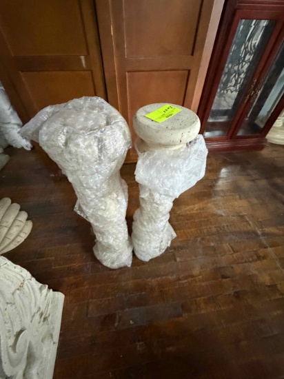 2 stone decorative pillers