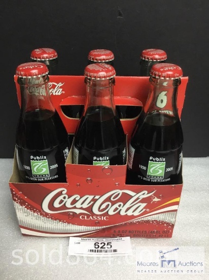 6 - Bottles of Coca-Cola
