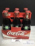 6 - Bottles of Coca-Cola