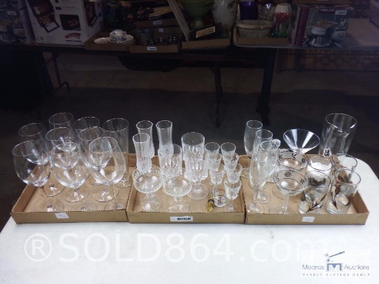 Three full boxes of crystal stemware - wine glasses - bar glasses