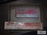 Two boxes of welding rods and electrodes