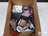 Box of miscellaneous lenses, parking lights, brake pads