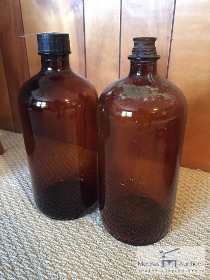 Group of 2 - Large amber glass bottles