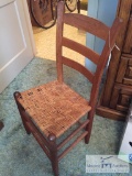 Vintage wooden chair with wicker seating