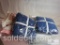 Assorted blankets pillows and cloth napkins