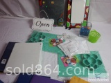 Miscellaneous office supplies and decorative items.