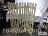 Fold up white picket fence.