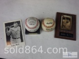 Babe Ruth plaque and photo, Sandy Koufax baseball, and baseball