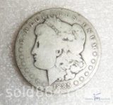 1885-O Morgan silver dollar
