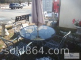 Metal and Glass patio table with chairs and umbrella