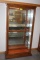 Oak Lighted Display Cabinet w/Glass Shelves.