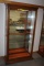 Oak Lighted Display Cabinet w/Glass Shelves.