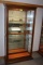 Oak Lighted Display Cabinet w/Glass Shelves.