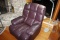 Recliner in Espresso or Dark Maroon Color.