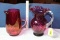 2 Swirl Cranberry Pitchers.