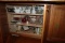 All Glassware and Other Items in 2 Cabinets Under Counter/Bar Area.