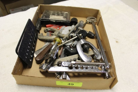 Box of Flare Tools, Tubing Cutters, Uni-Bit and Plumbing Wrench.