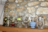 12 Oil Lamps and 1 Lantern.