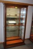 Oak Lighted Display Cabinet w/Glass Shelves.