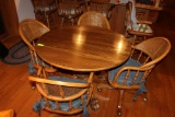 Oak Drop Leaf Table w/Claw Foot Pedestal and 4 Chairs.