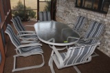 Patio Table w/Glass Top and 6 Matching Chairs.