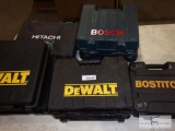 Eight empty tool cases - no tools in any case