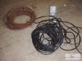 Roll of hoses, breaker box with wire