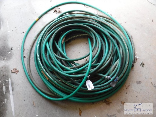 Large lot of garden hoses