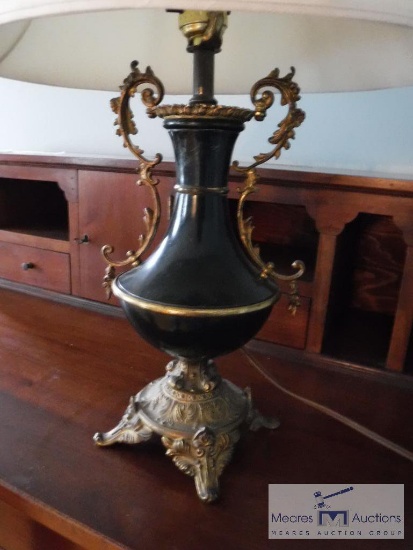 Black and brass colored desk lamp with shade