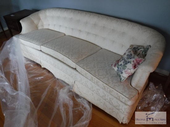 Beautiful cream colored sofa