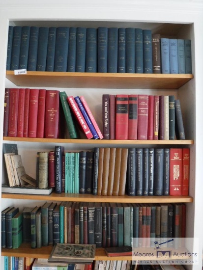 Four shelves of legal, engineering and educational books