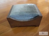 Wooden footstool with cushioned center area