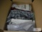 Large lot of new men's shirts in original packaging