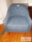 Blue upholstered corner chair