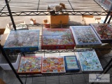 Large lot of jigsaw puzzles