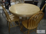 Wooden table with retractable leaf and (4) chairs