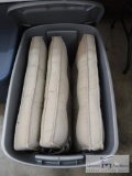 Plastic tote of chair cushions