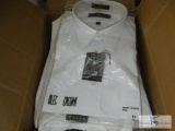 Large lot of new men's shirts in original packaging