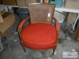 Chair with cushioned seat and woven back
