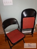 Group of (3) metal folding chairs with cushioned seats