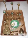 Group of brass candle holders and decorative items