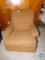 Brown swivel chair with ottoman
