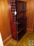 Wooden shelf with spindle posts